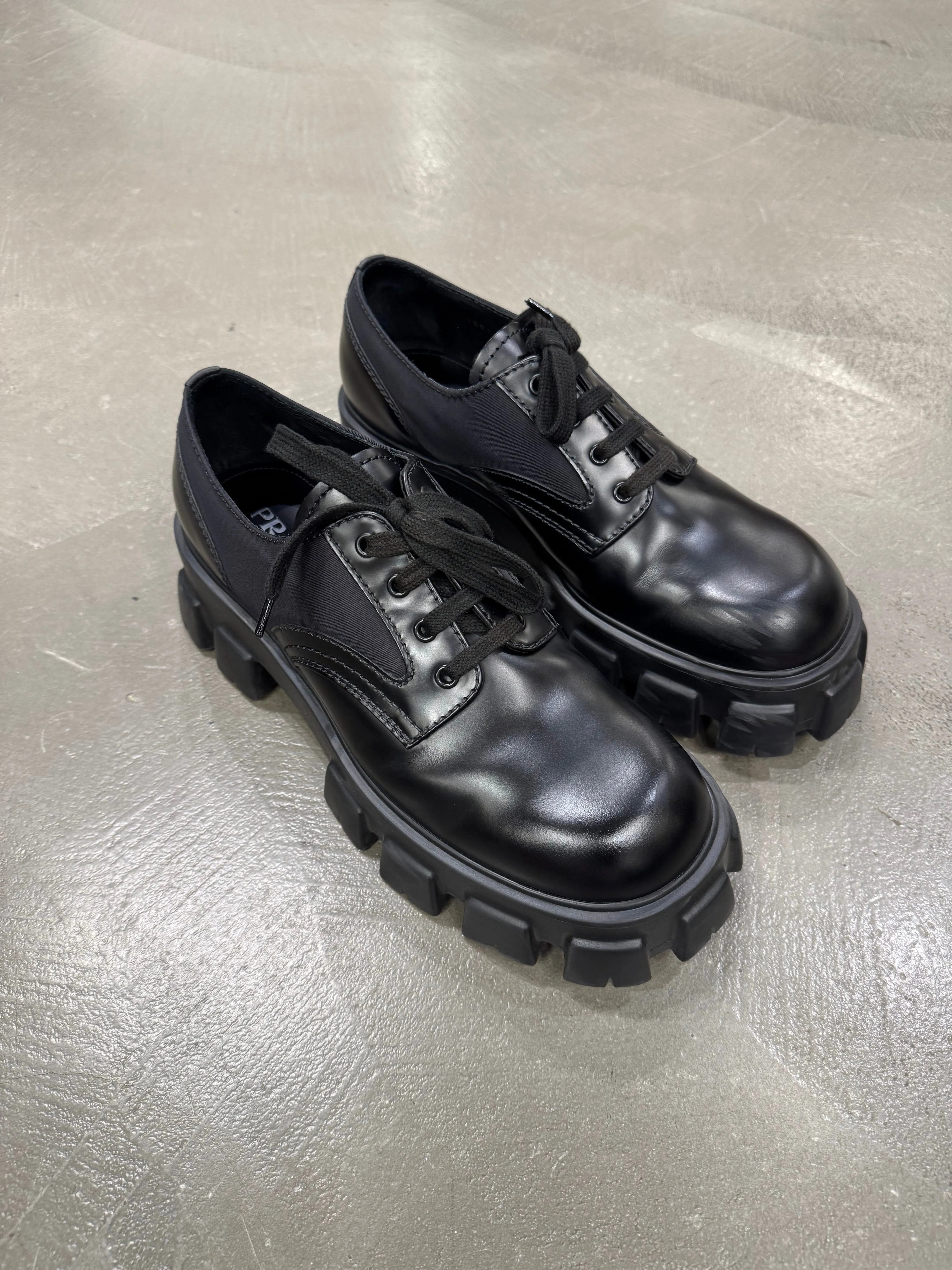 2023 Prada monolith leather/Nylon derby shoes
