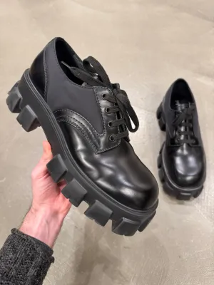 2023 Prada monolith leather/Nylon derby shoes