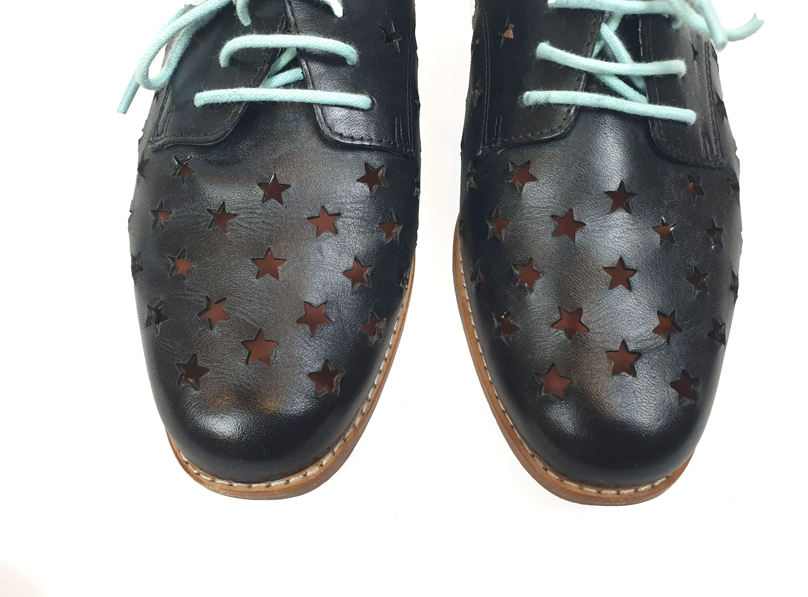 Bared black leather laceups with star perforations size 36
