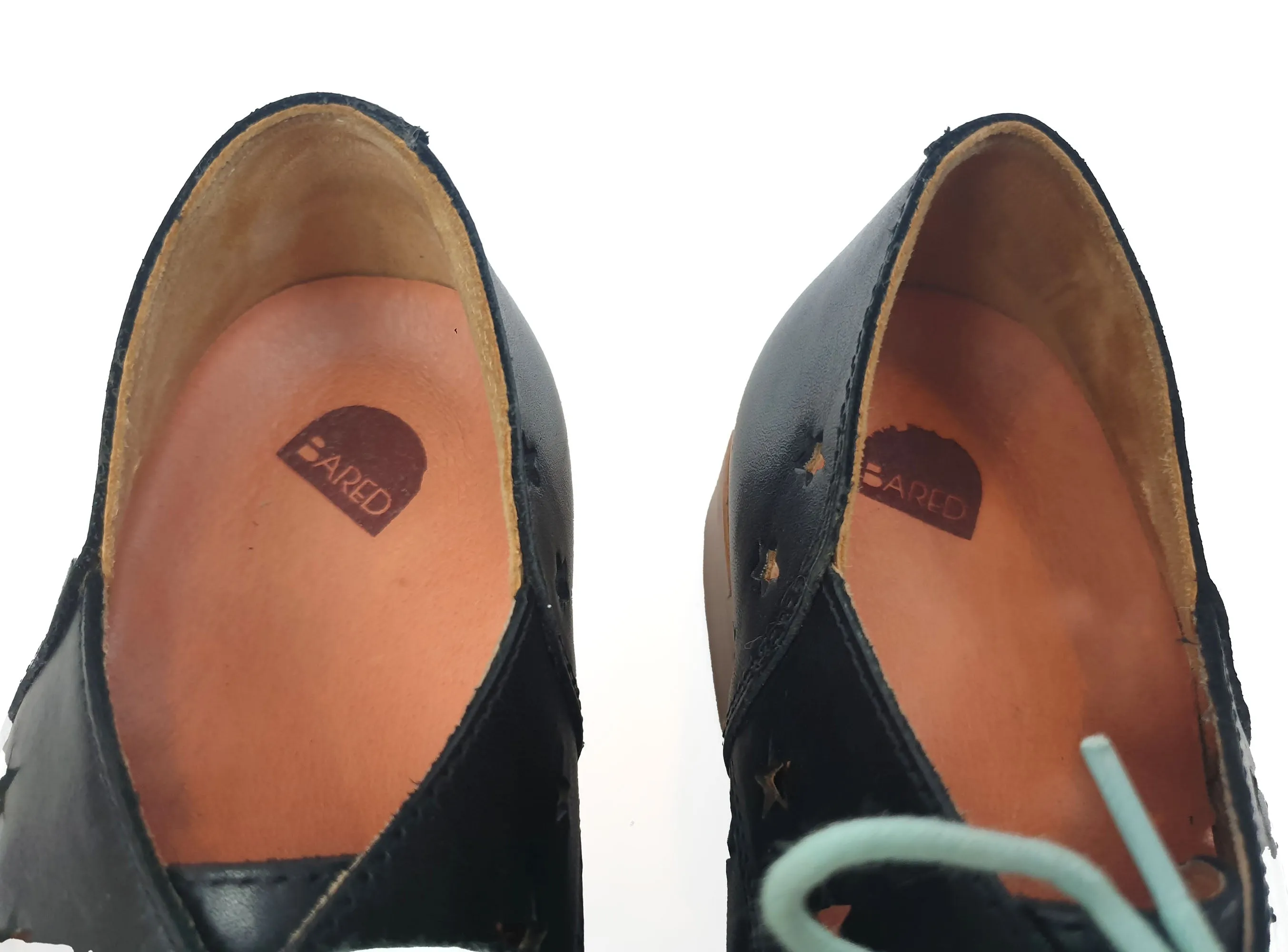 Bared black leather laceups with star perforations size 36