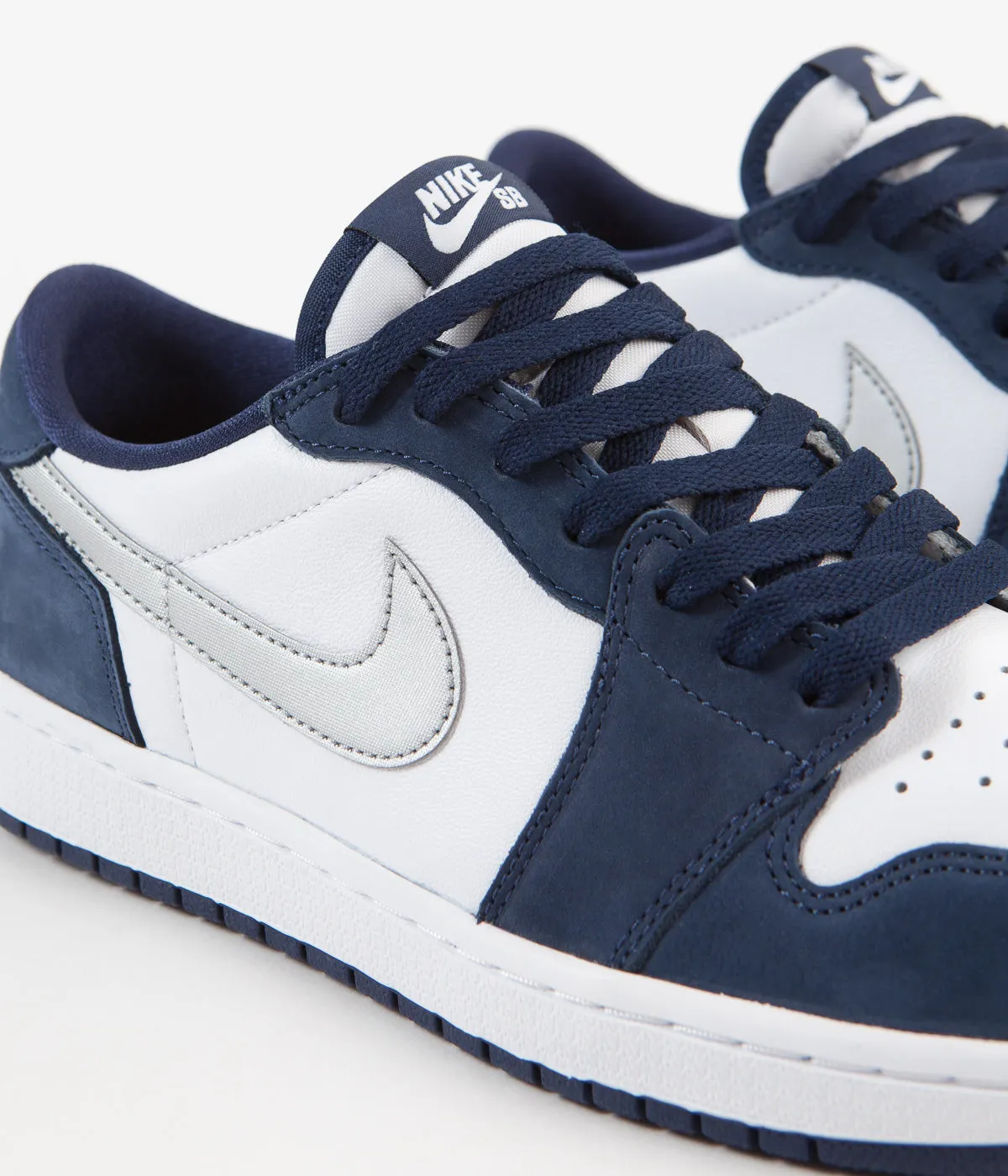 Nike SB x Air Jordan 1 Low Shoes - Midnight Navy / Metallic Silver - White