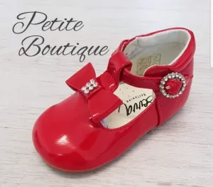 Red T-bar shoes